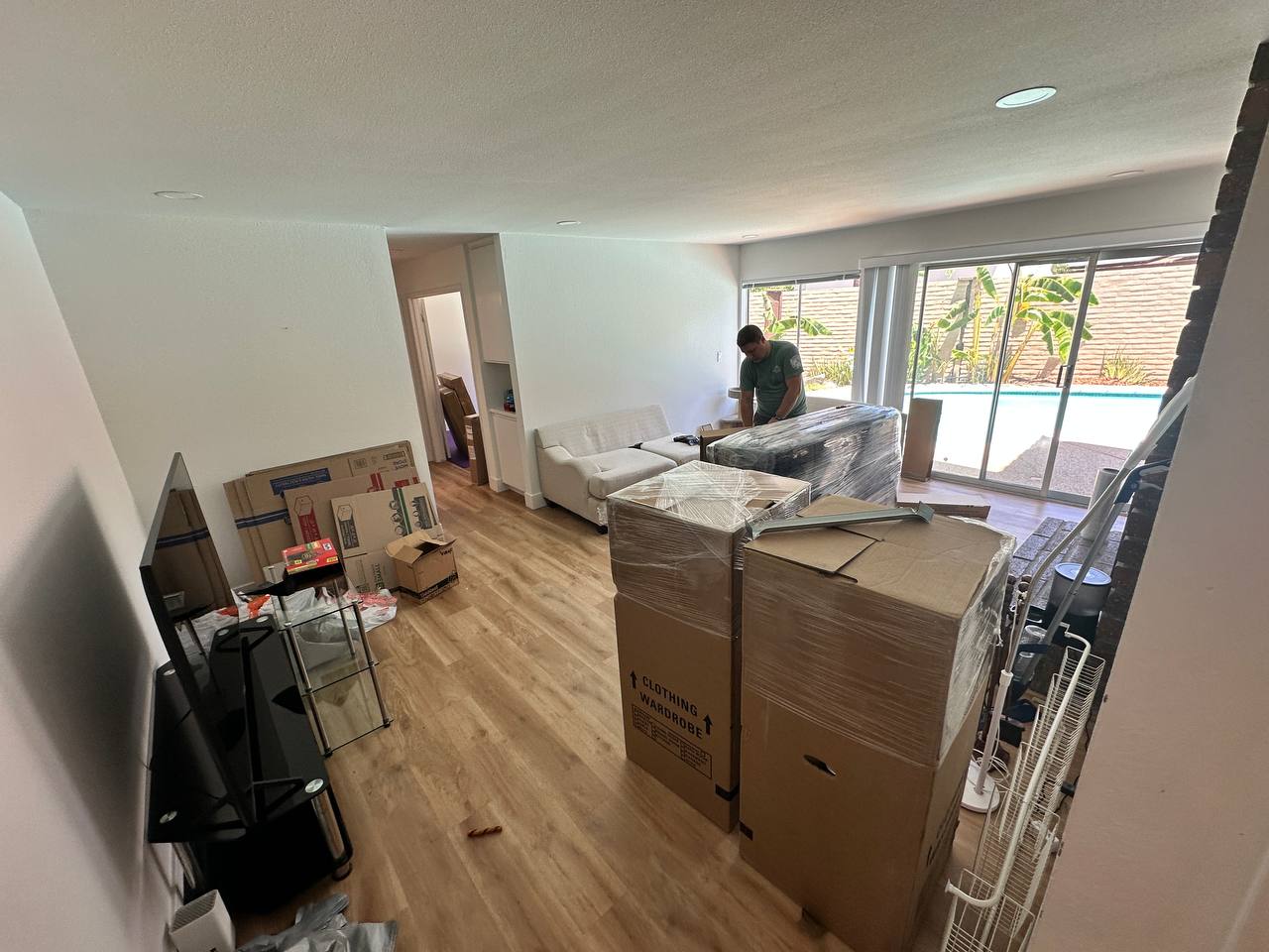 Movers packing kitchen items in San Francisco